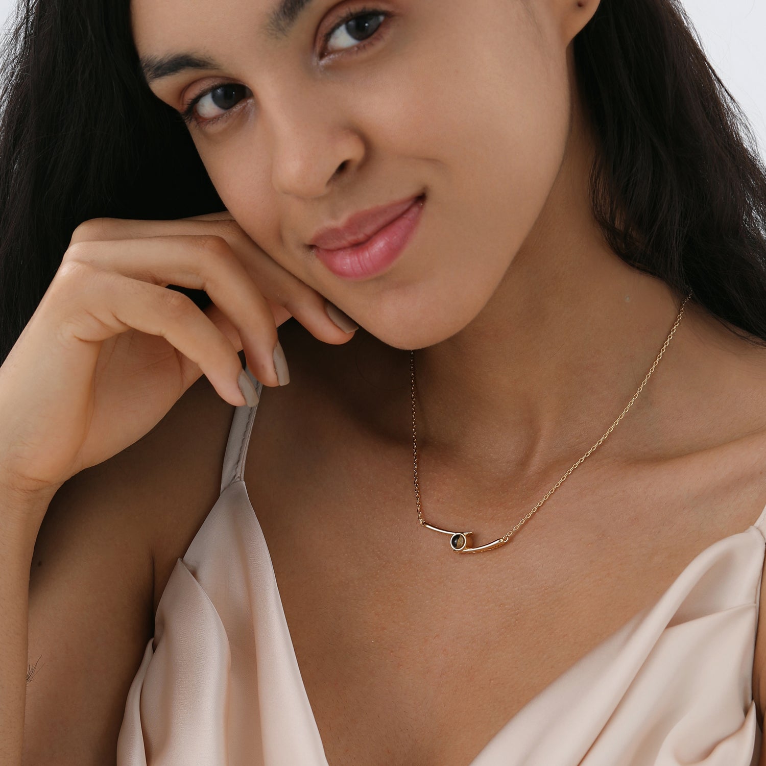 Custom gold necklace with personalized photo projection