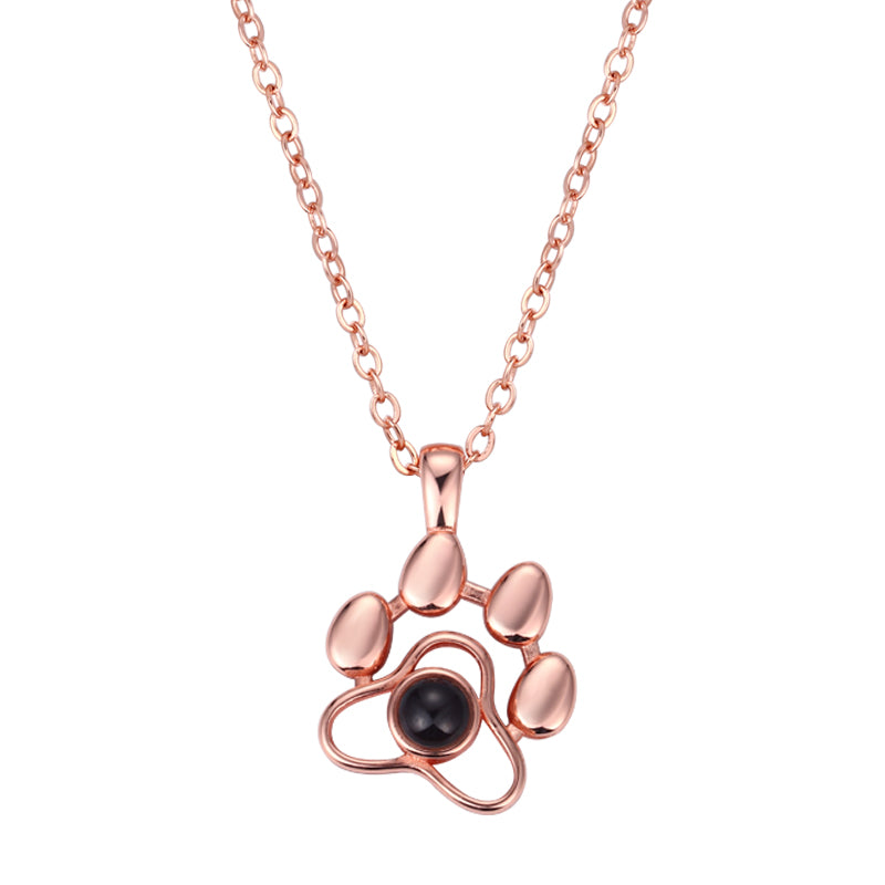Pet memorial necklace with paw print pendant and custom photo inside