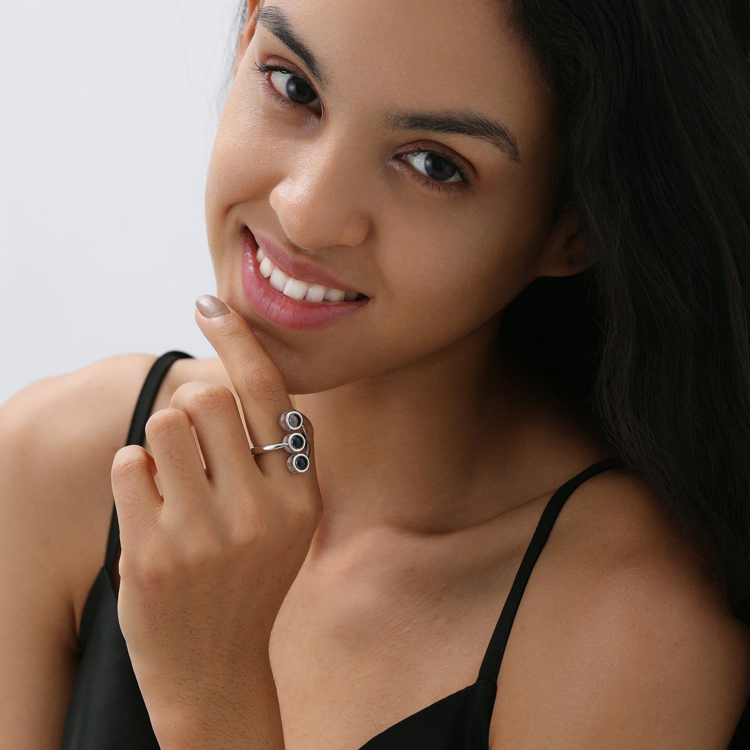 Custom photo ring showing three cherished memories