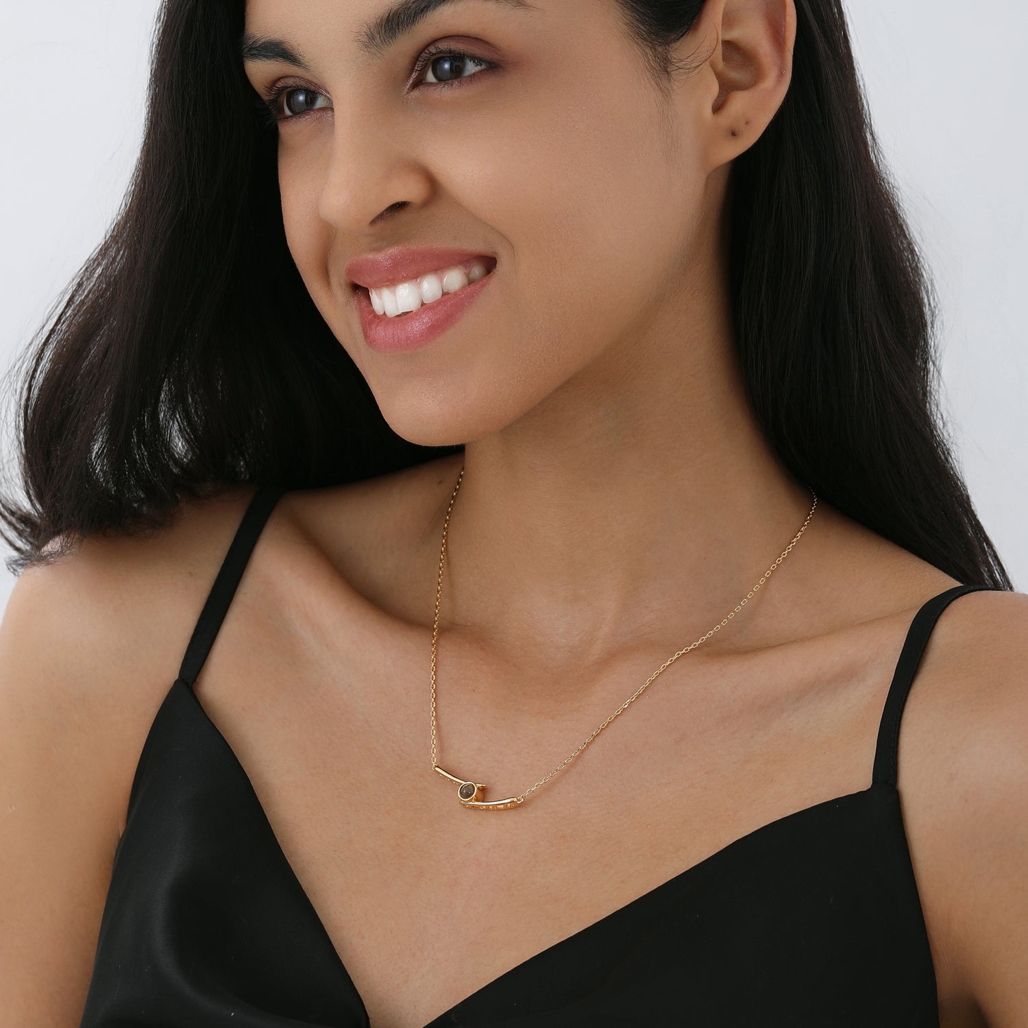 Custom gold necklace with personalized photo projection