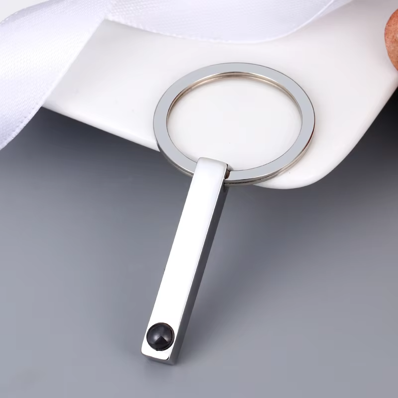 Personalized keepsake keychain with hidden photo projection