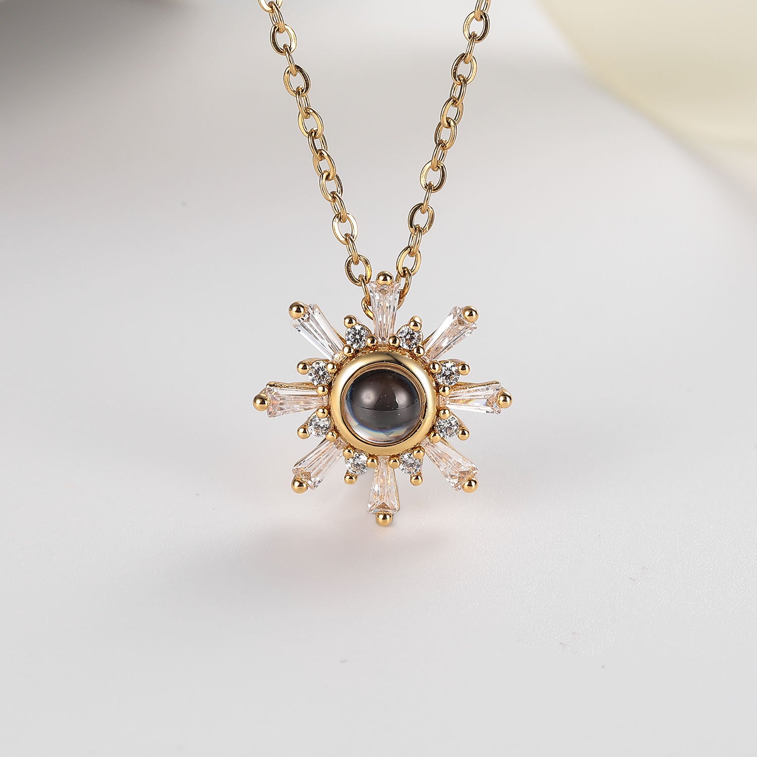 Personalized winter-themed photo projection jewelry by Phomora