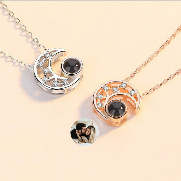 Woman wearing personalized moon photo projection necklace