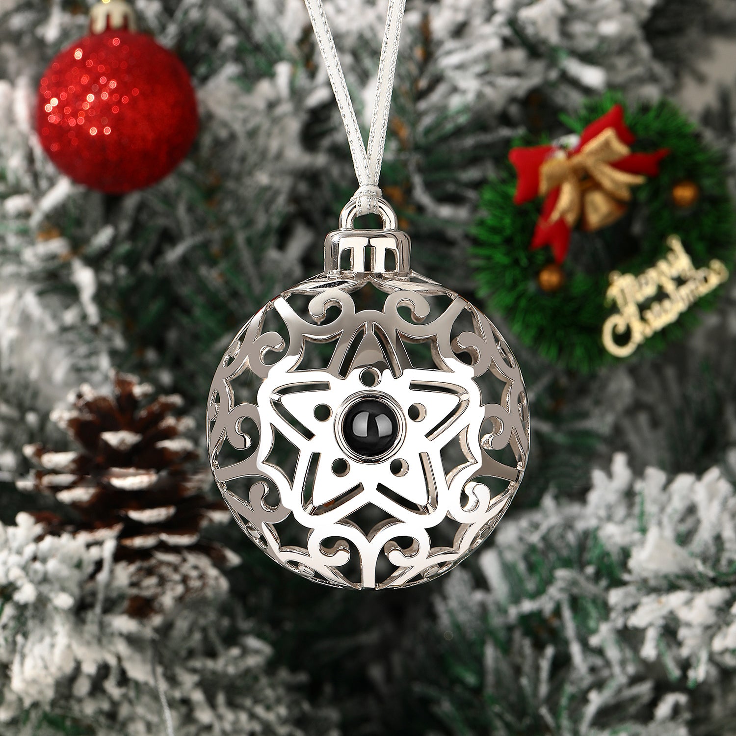 Christmas tree ornament with hidden projection photo