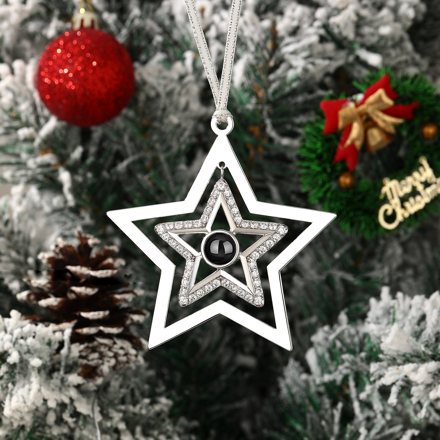 Star-shaped Christmas ornament with hidden photo projection